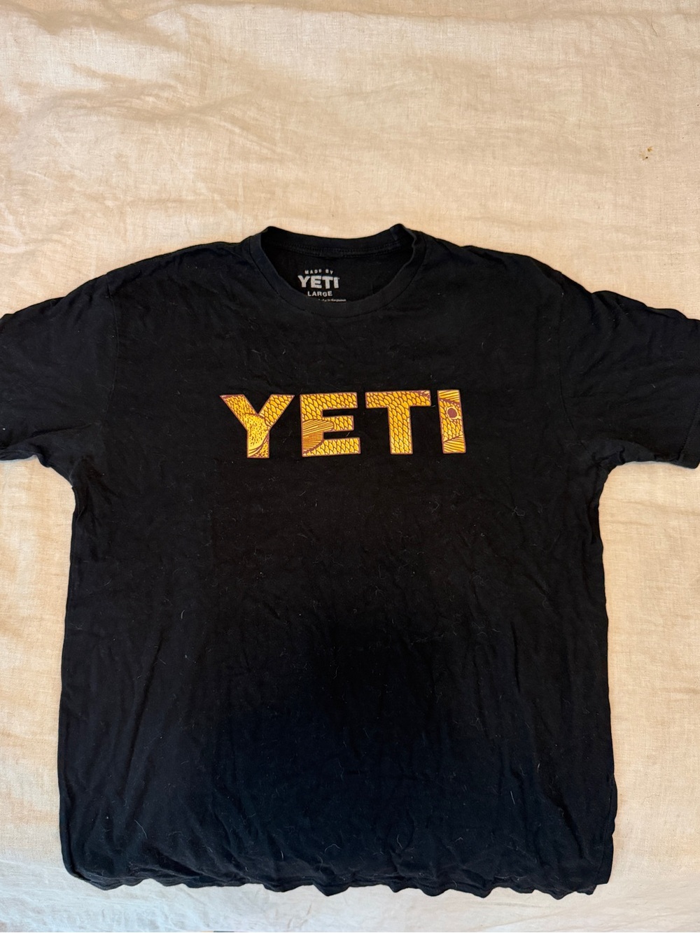 Yeti Black Short-Sleeve Tee with Yellow Logo